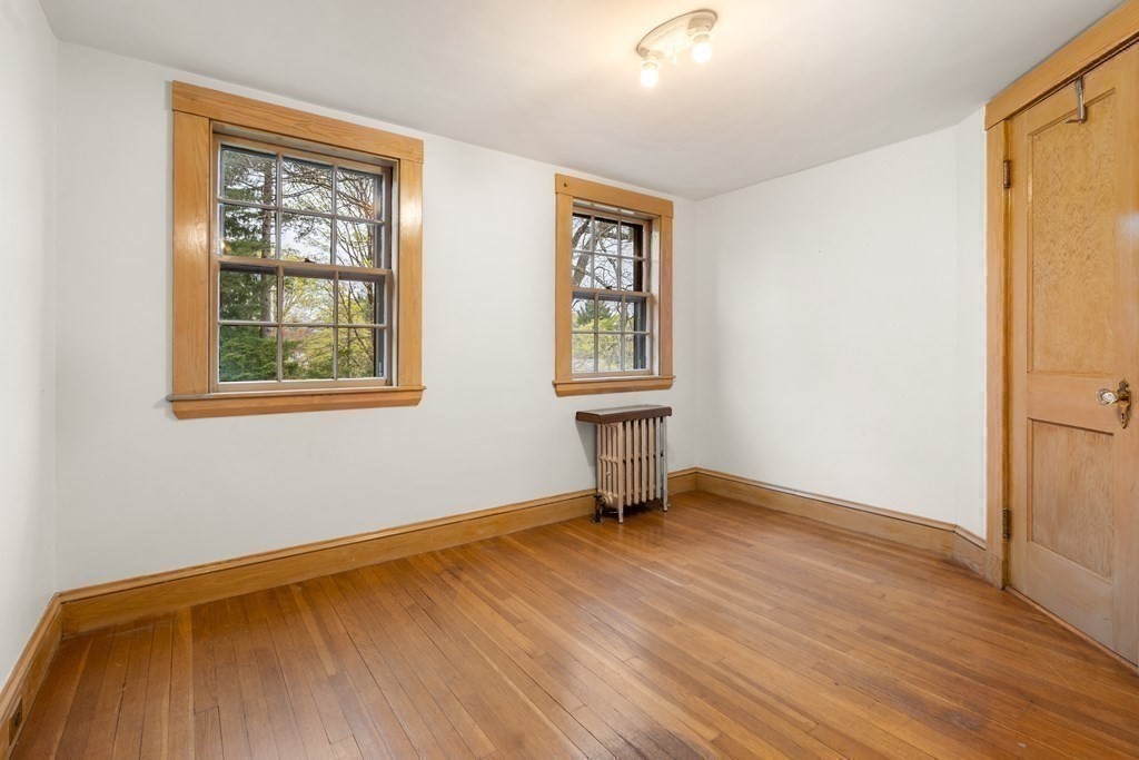 110 Cedar Street Newton, MA 02459 - Photo 22 of 28 an empty room with windows