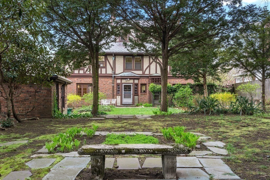 110 Cedar Street Newton, MA 02459 - Photo 27 of 28 a front view of a house with garden