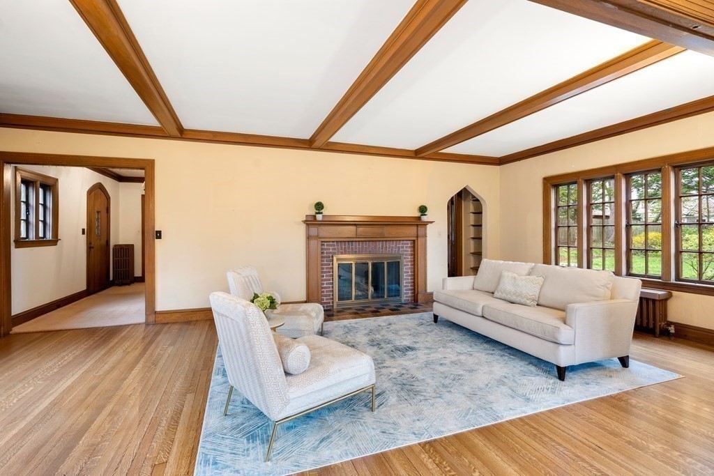 110 Cedar Street Newton, MA 02459 - Photo 5 of 28 a living room with furniture large window and a fireplace