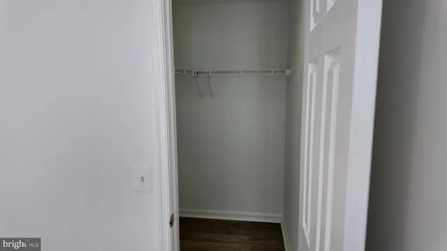 a bathroom with a sink mirror and vanity