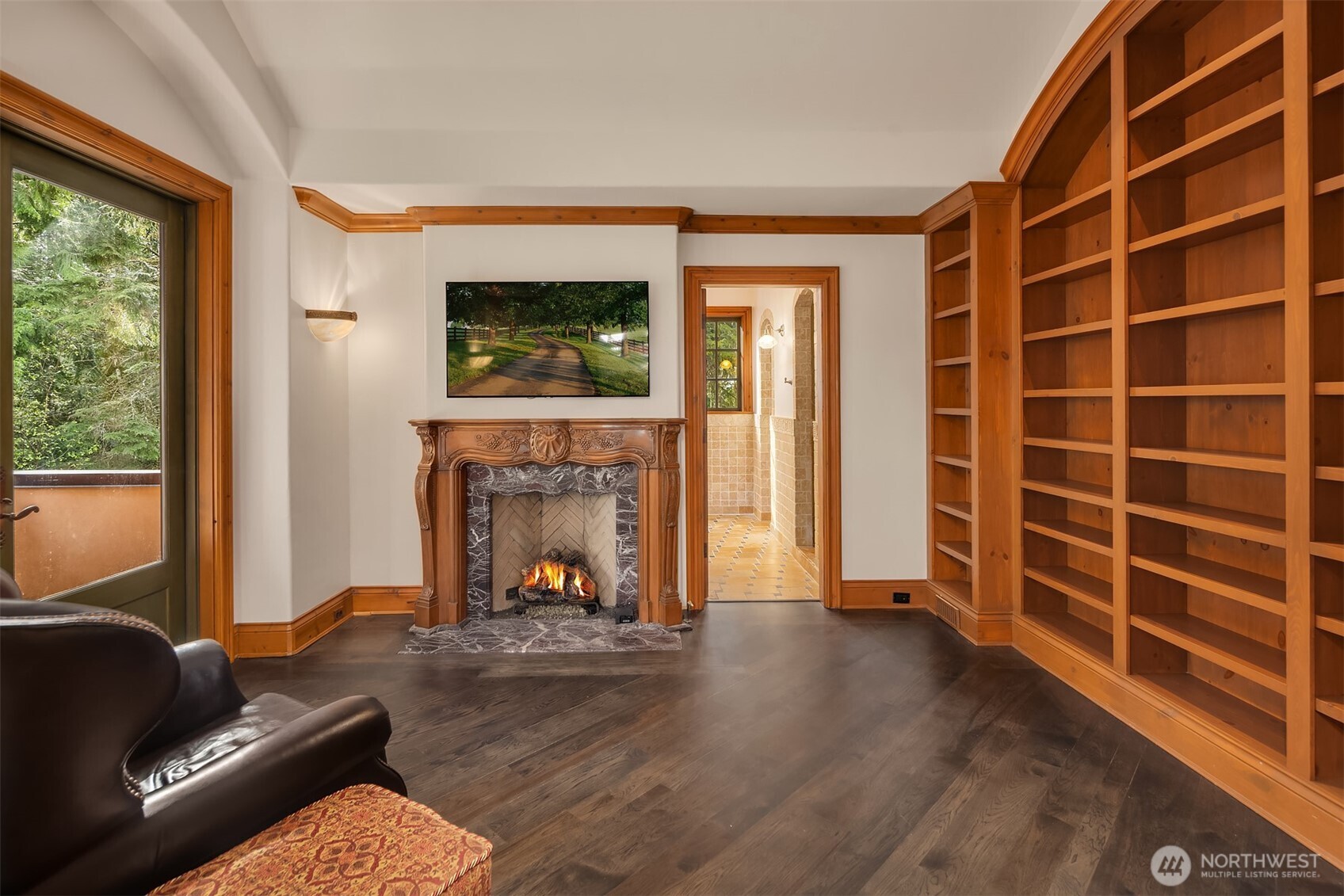 5565 248th Place Southeast Issaquah, WA 98029 - Photo 18 of 33 a living room with furniture and a fireplace