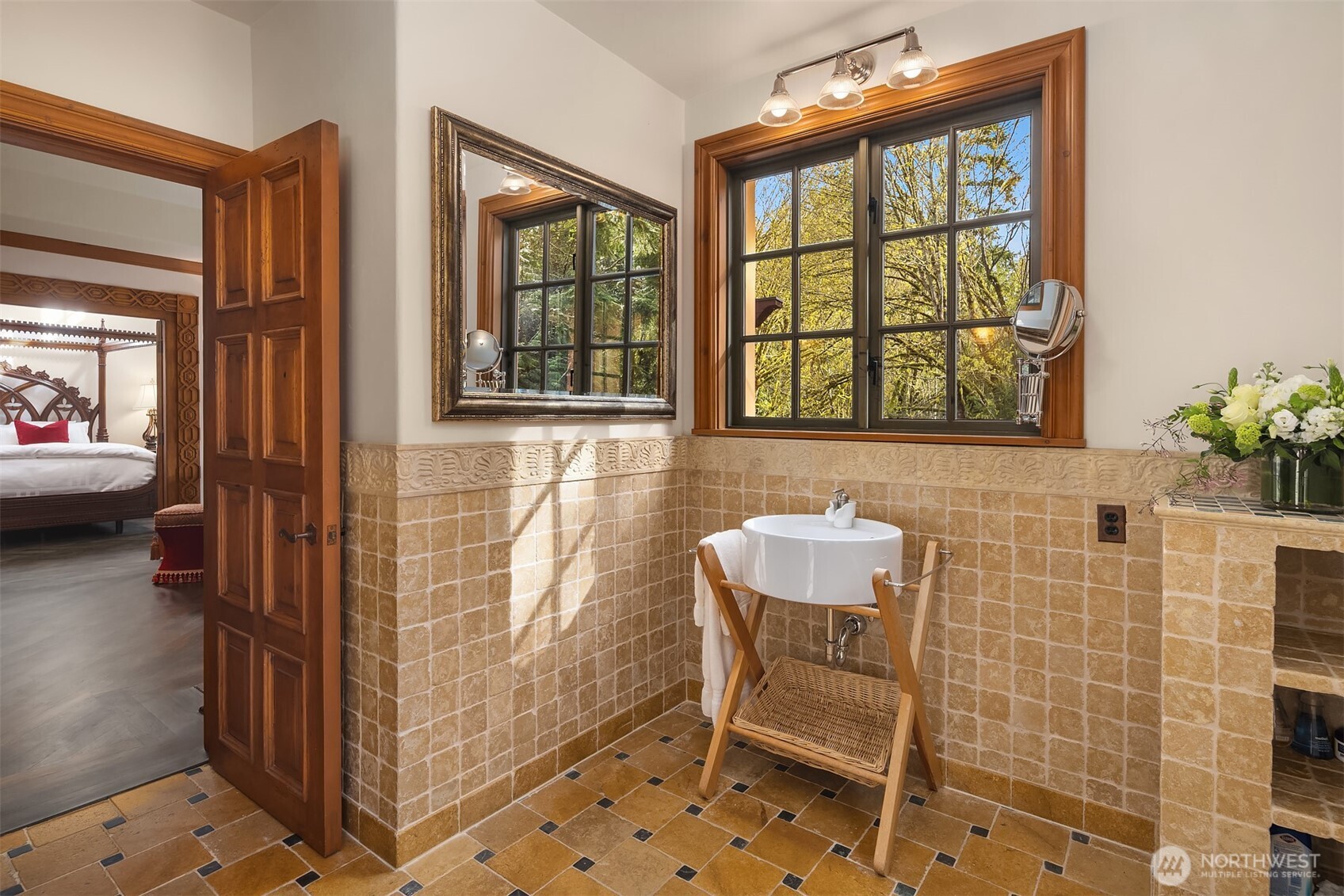 5565 248th Place Southeast Issaquah, WA 98029 - Photo 19 of 33 a bathroom with a sink and a mirror