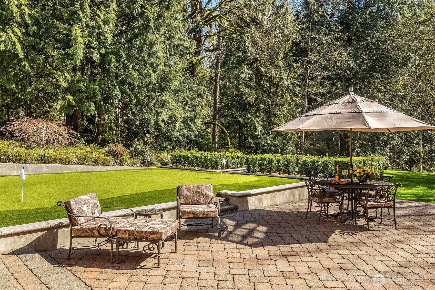 5565 248th Place Southeast Issaquah, WA 98029 - Photo 27 of 33 an outdoor space with furniture and umbrella