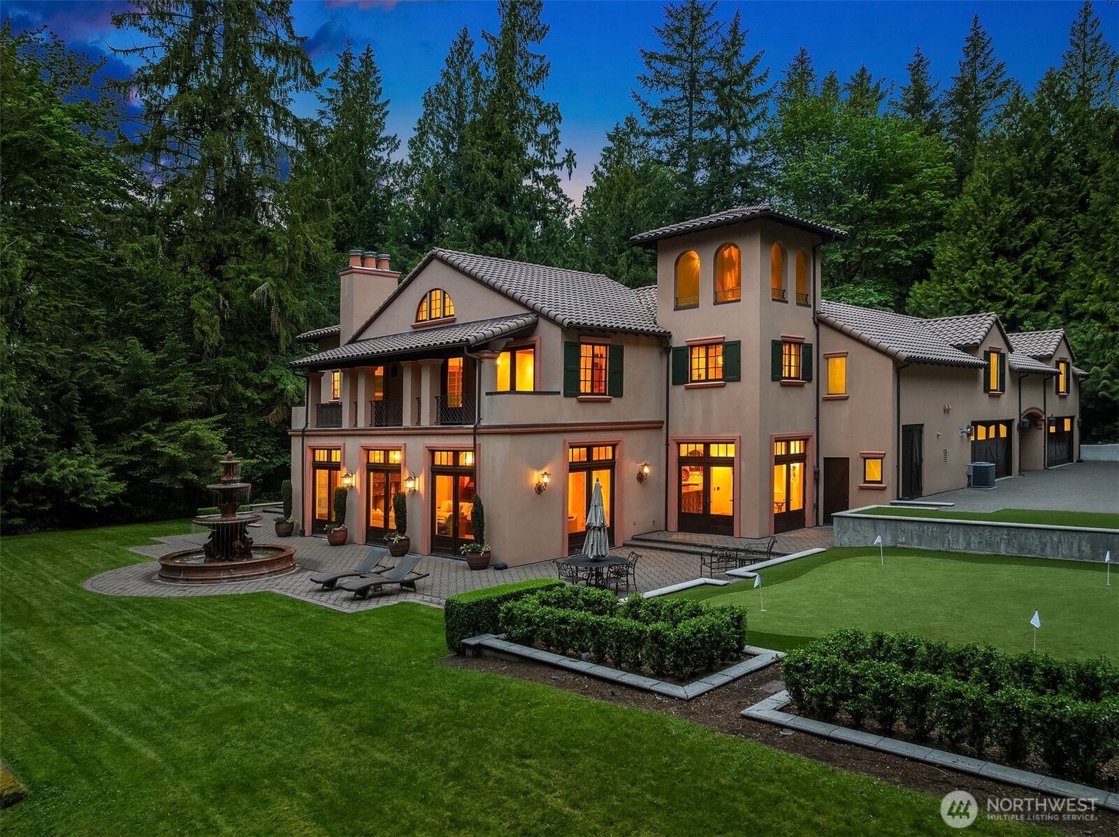 5565 248th Place Southeast Issaquah, WA 98029 - Photo 29 of 33 a front view of a house with a yard table and chairs