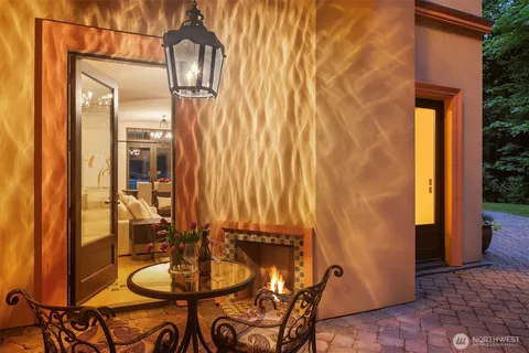 a bathroom with a mirror and a shower