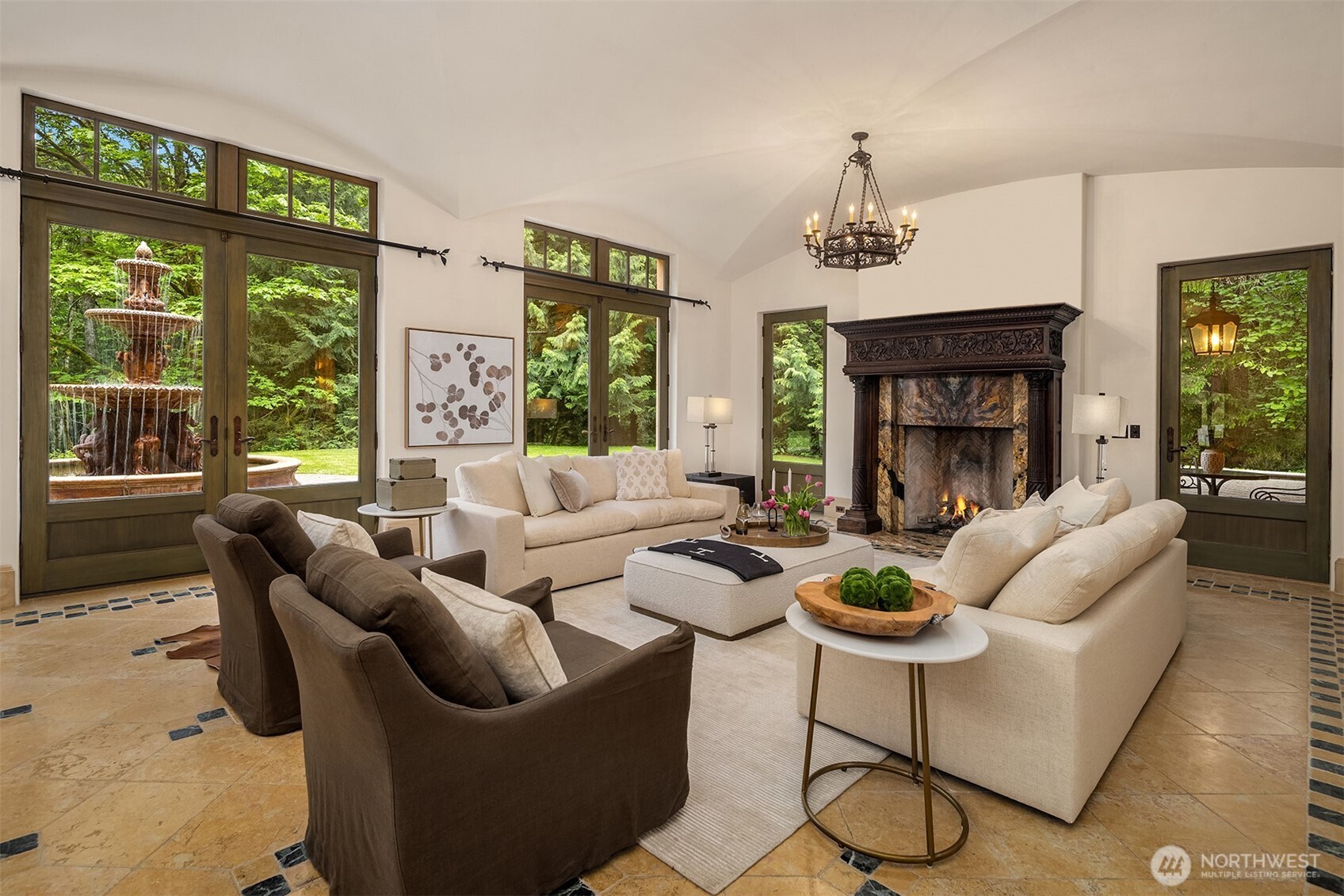 5565 248th Place Southeast Issaquah, WA 98029 - Photo 4 of 33 a living room with furniture a large window and a fireplace