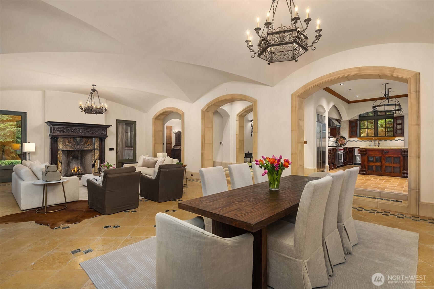 5565 248th Place Southeast Issaquah, WA 98029 - Photo 6 of 33 a view of a dining room with furniture a chandelier and wooden floor