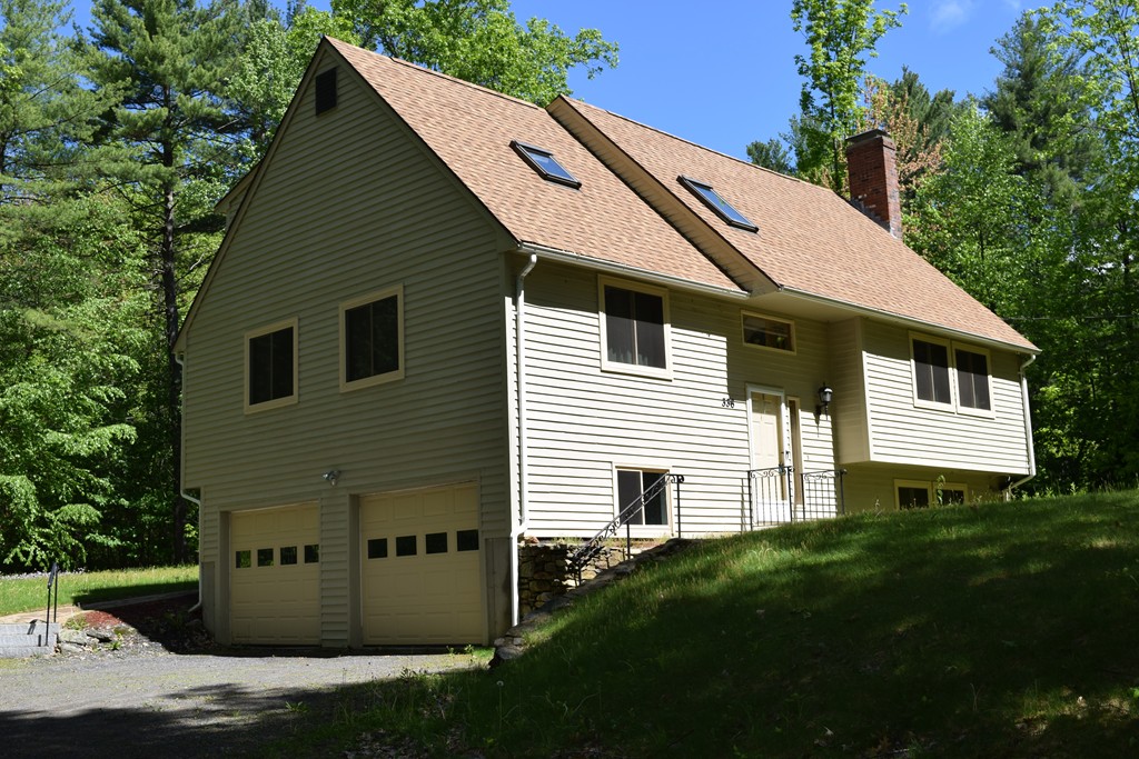 a view of a back yard of the house