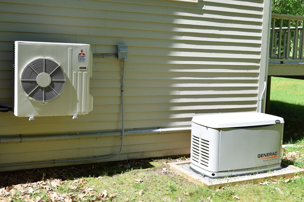 336 Sterling Road Holden, MA 01522 - Photo 5 of 16 a view of a utility room with a door
