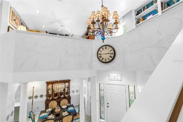 a kitchen with stainless steel appliances a refrigerator sink and cabinets