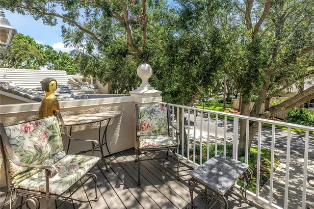 a view of a chairs and tables in the terrace