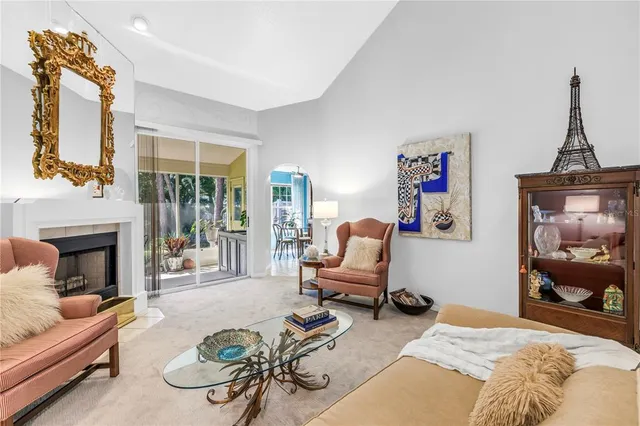 a bedroom with furniture and a fireplace