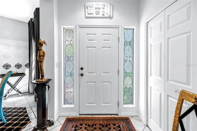 a view of a livingroom with furniture and hardwood floor