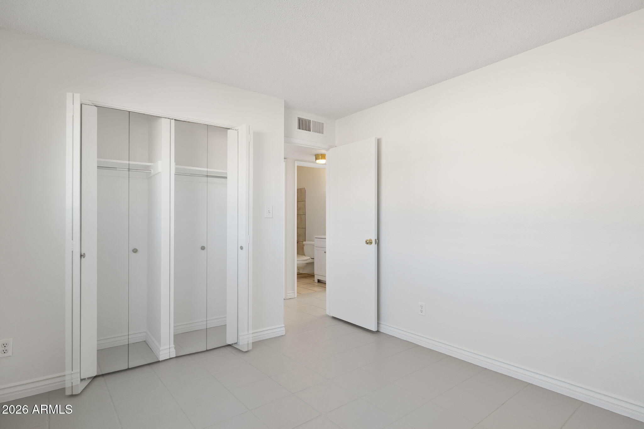 825 North Hayden Road, Unit C104 Scottsdale, AZ 85257 - Photo 10 of 33 a view of room with walk in closet