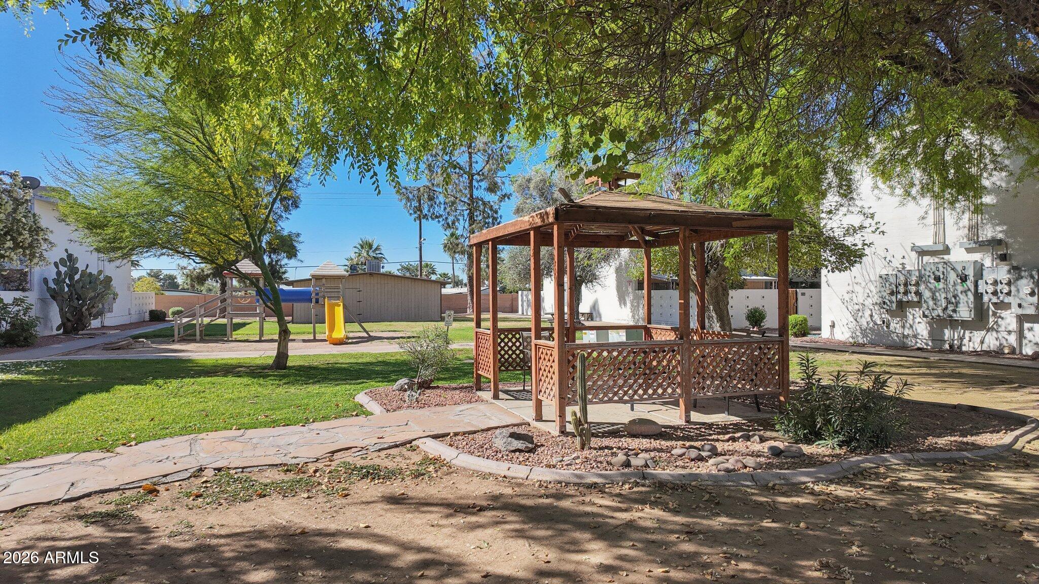 825 North Hayden Road, Unit C104 Scottsdale, AZ 85257 - Photo 23 of 33 a view of a barn with a yard