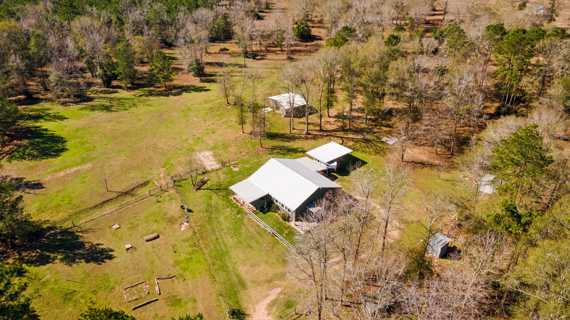a aerial view of residential houses with swimming pool