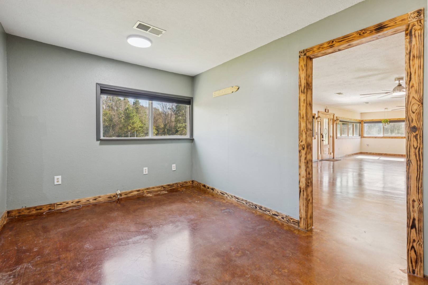 392 Robert E Lee Road Livingston, TX 77351 - Photo 13 of 43 an empty room with windows