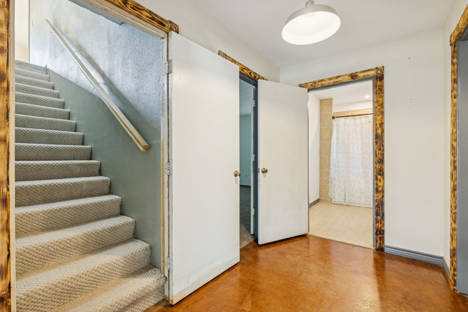 392 Robert E Lee Road Livingston, TX 77351 - Photo 22 of 43 a view of entryway and hall with wooden floor
