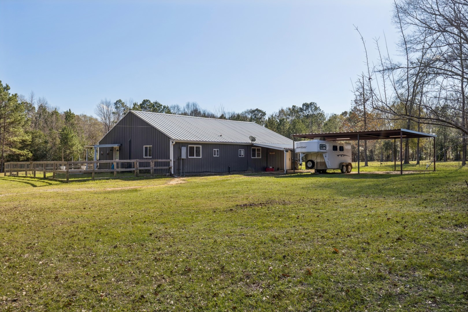 392 Robert E Lee Road Livingston, TX 77351 - Photo 29 of 43 a front view of house with outdoor space and swimming pool