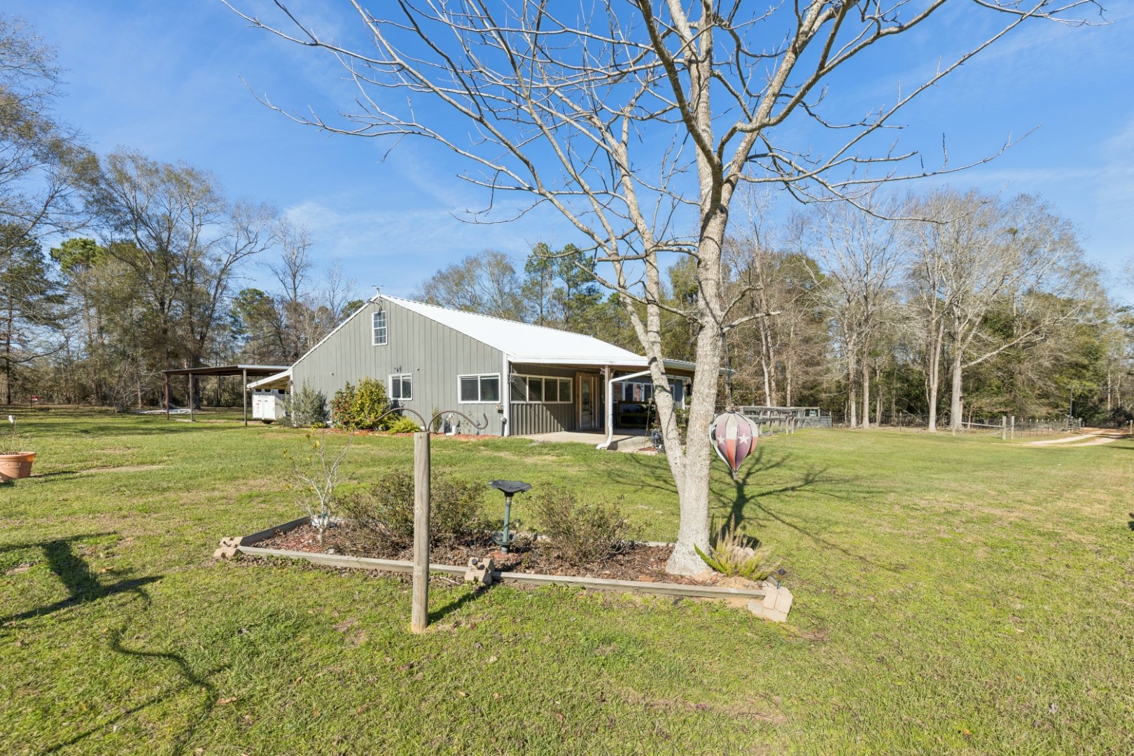 392 Robert E Lee Road Livingston, TX 77351 - Photo 3 of 43 a view of a house with a yard