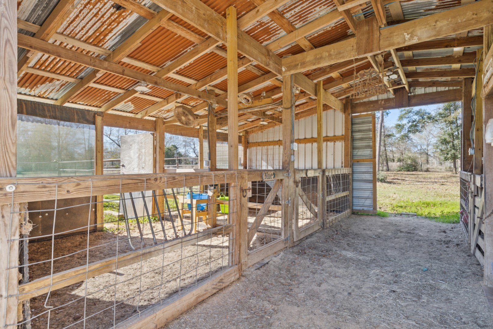 392 Robert E Lee Road Livingston, TX 77351 - Photo 32 of 43 a view of a porch with a wooden fence