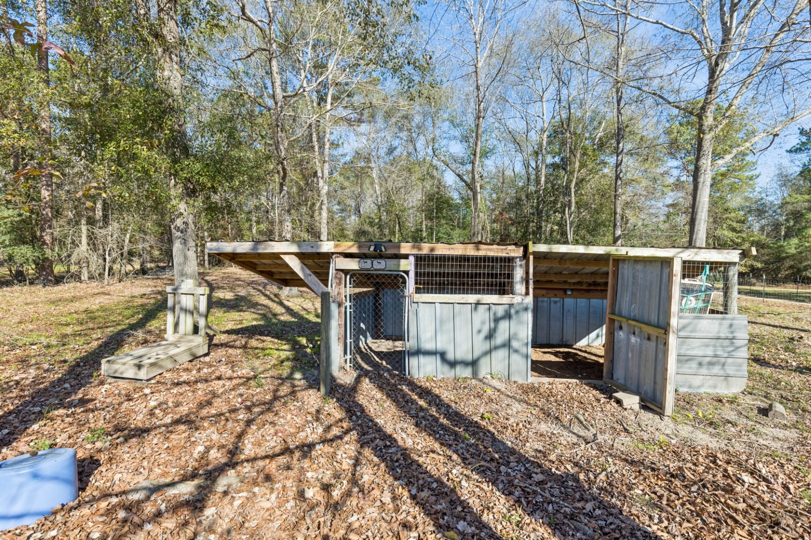 392 Robert E Lee Road Livingston, TX 77351 - Photo 34 of 43 a view of a patio with wooden floor