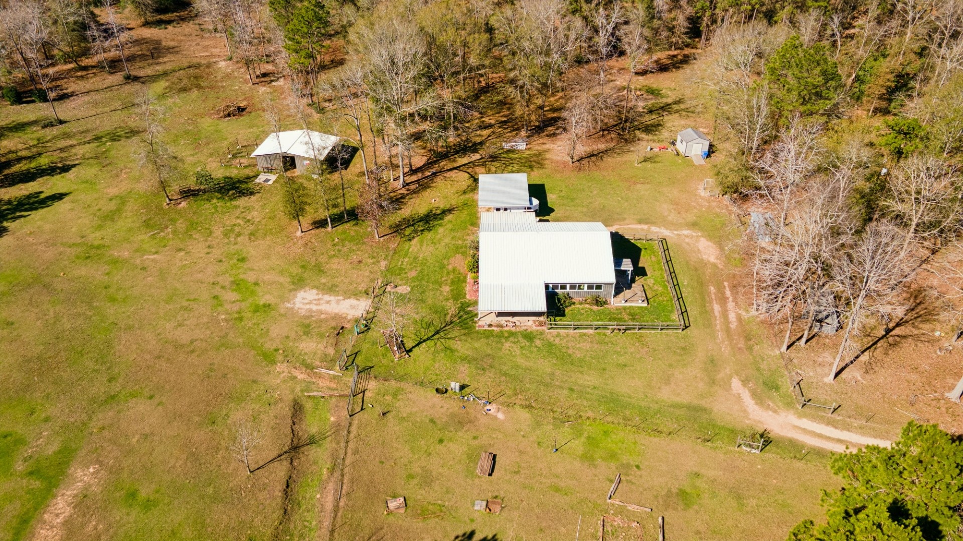 392 Robert E Lee Road Livingston, TX 77351 - Photo 40 of 43 a view of a yard with trees