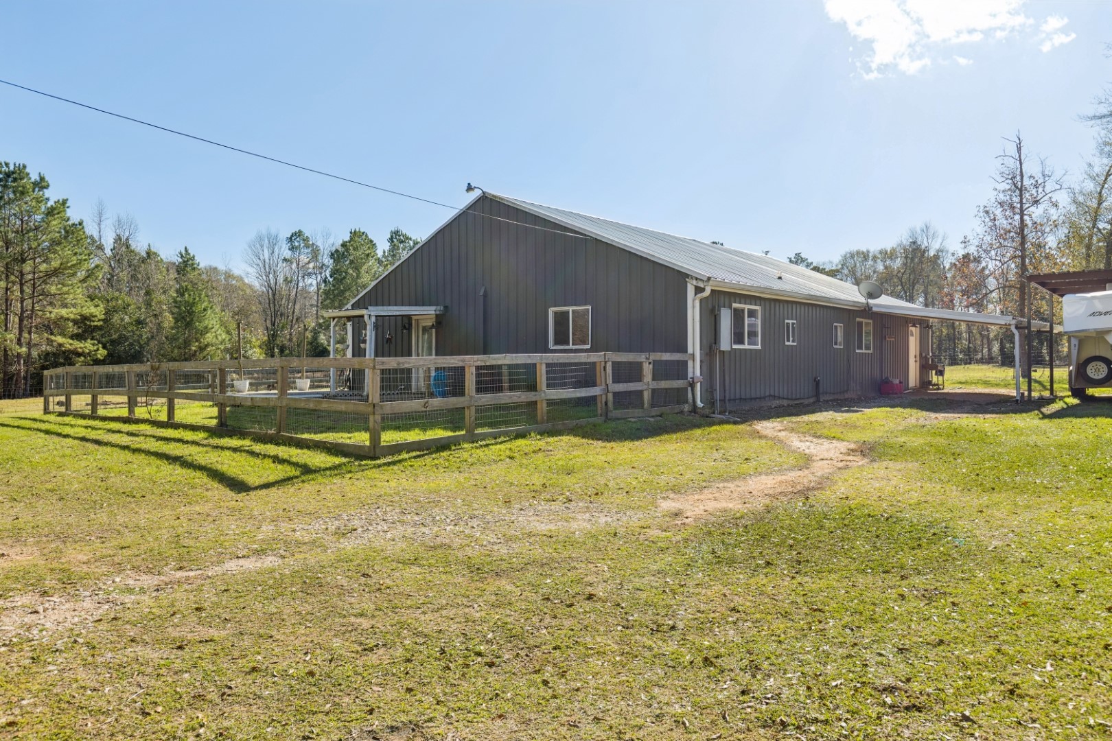 392 Robert E Lee Road Livingston, TX 77351 - Photo 4 of 43 a view of a house with a swimming pool