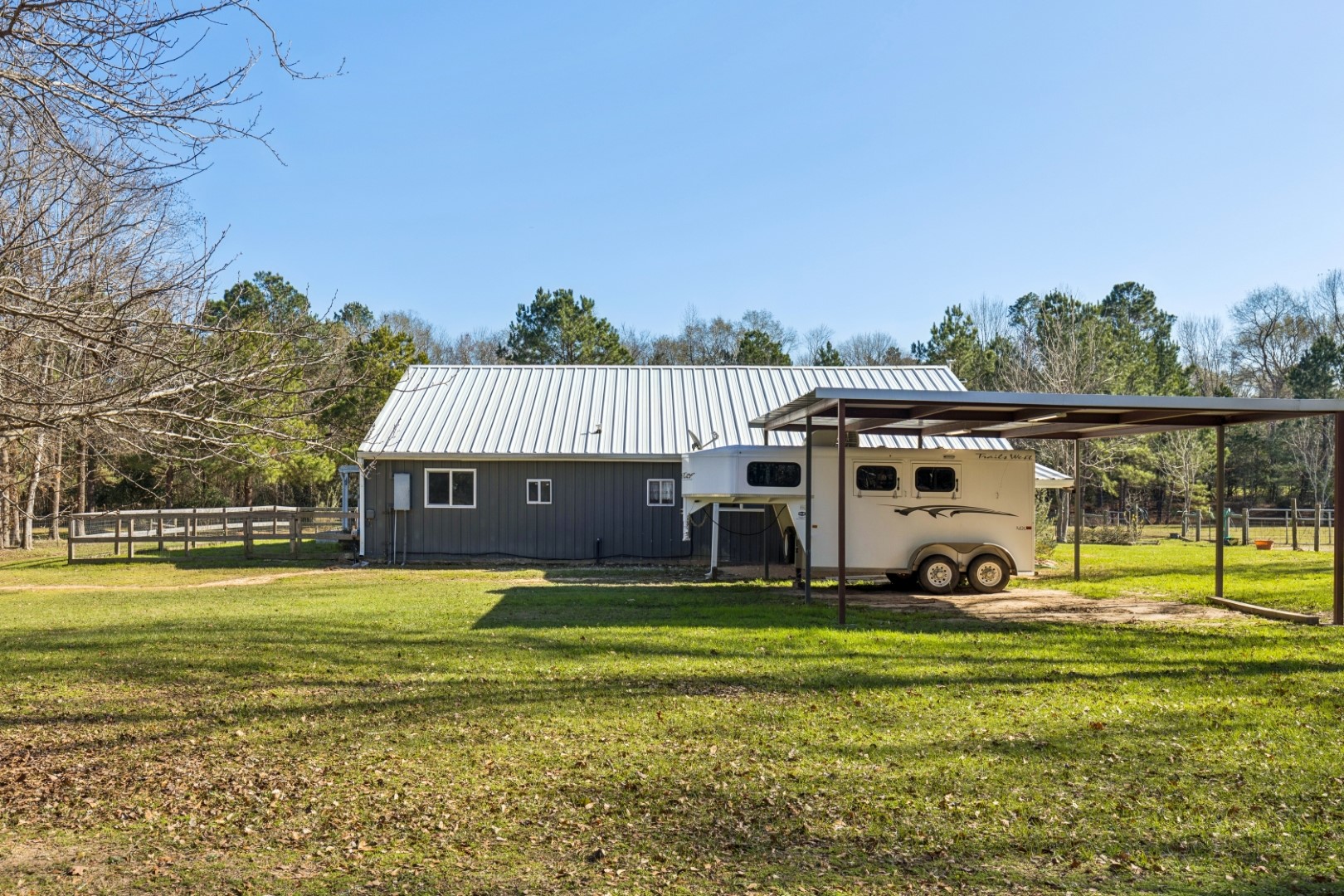 392 Robert E Lee Road Livingston, TX 77351 - Photo 5 of 43 a view of a house with a big yard