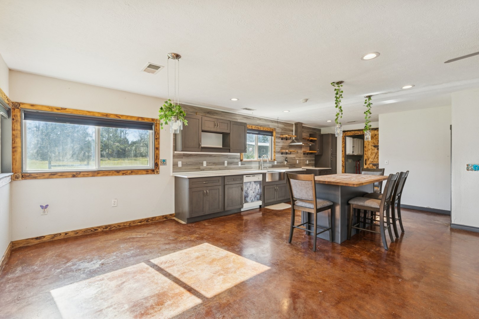392 Robert E Lee Road Livingston, TX 77351 - Photo 8 of 43 a view of a dining room with furniture window and wooden floor