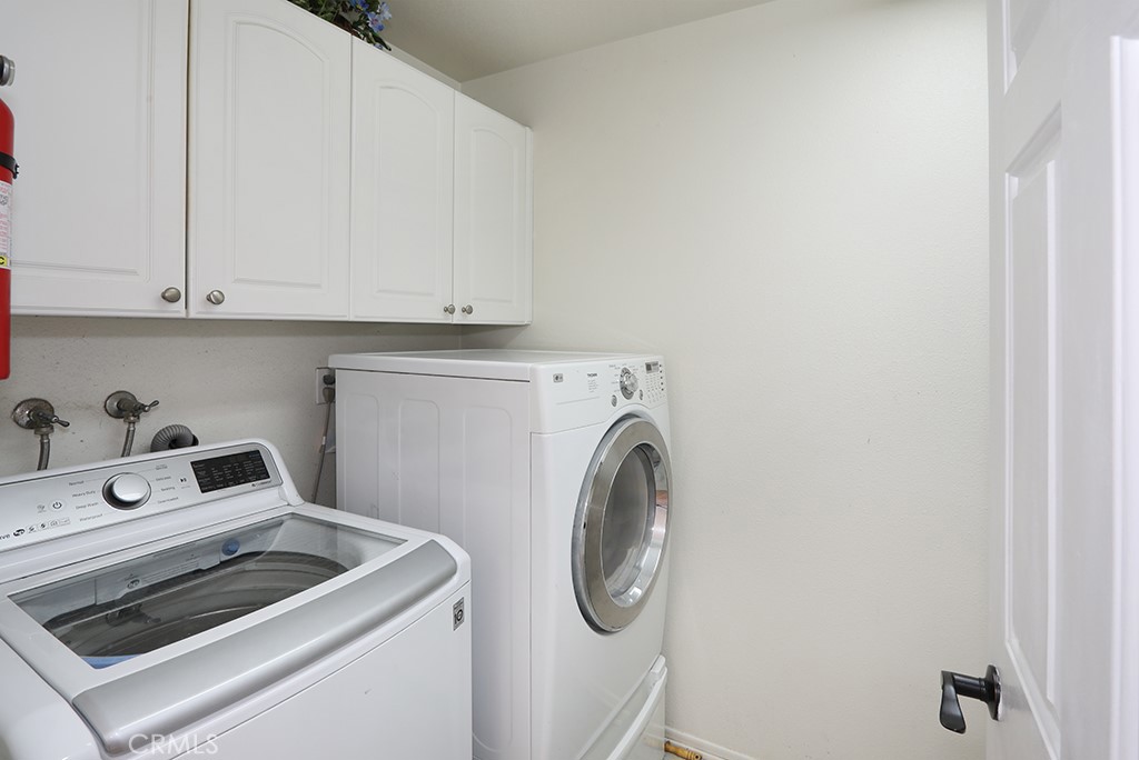 21 Tradition Place Irvine, CA 92602 - Photo 24 of 47 Upstairs laundry