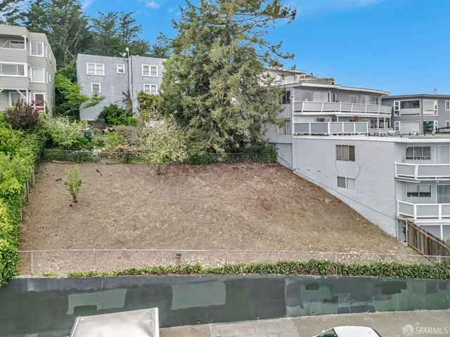an aerial view of residential house with outdoor space
