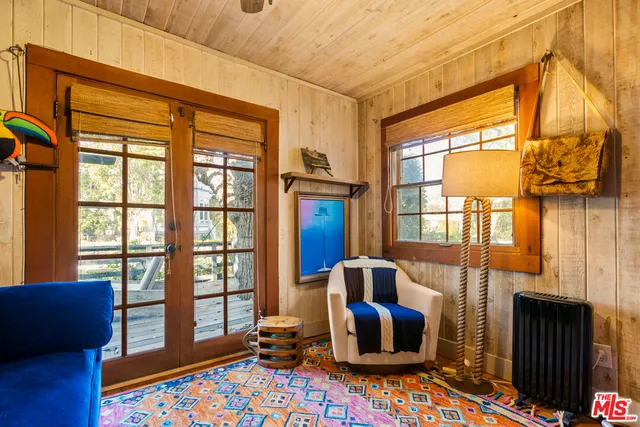 a view of city from balcony with outdoor seating