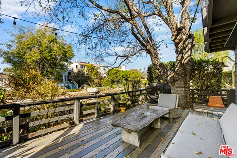 a view of house with outdoor seating