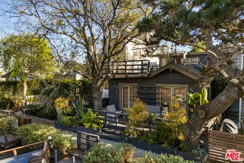 front view of house with a tree