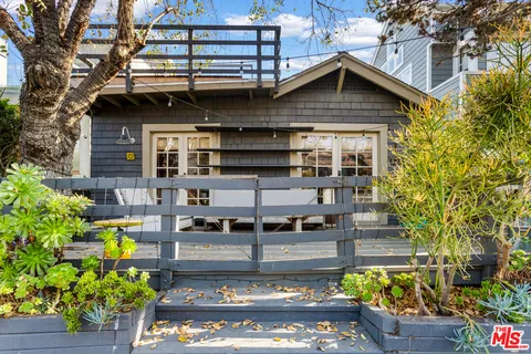 a view of swimming pool with outdoor seating