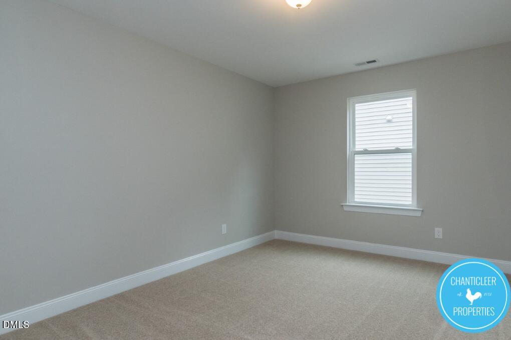 2528 Reynolds Drive Graham, NC 27253 - Photo 15 of 21 an empty room with a window