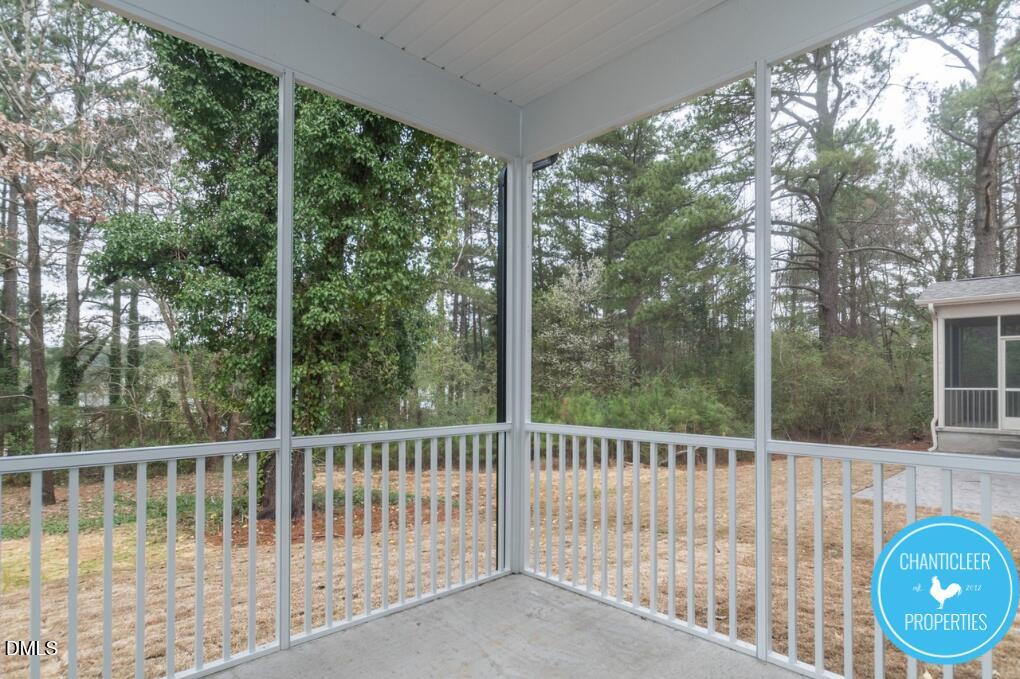 2528 Reynolds Drive Graham, NC 27253 - Photo 19 of 21 a view of a wooden deck and a yard