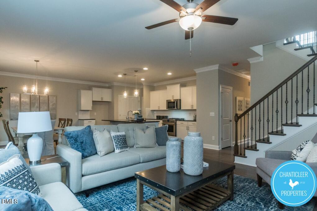 2528 Reynolds Drive Graham, NC 27253 - Photo 5 of 21 a living room with furniture kitchen view and a chandelier