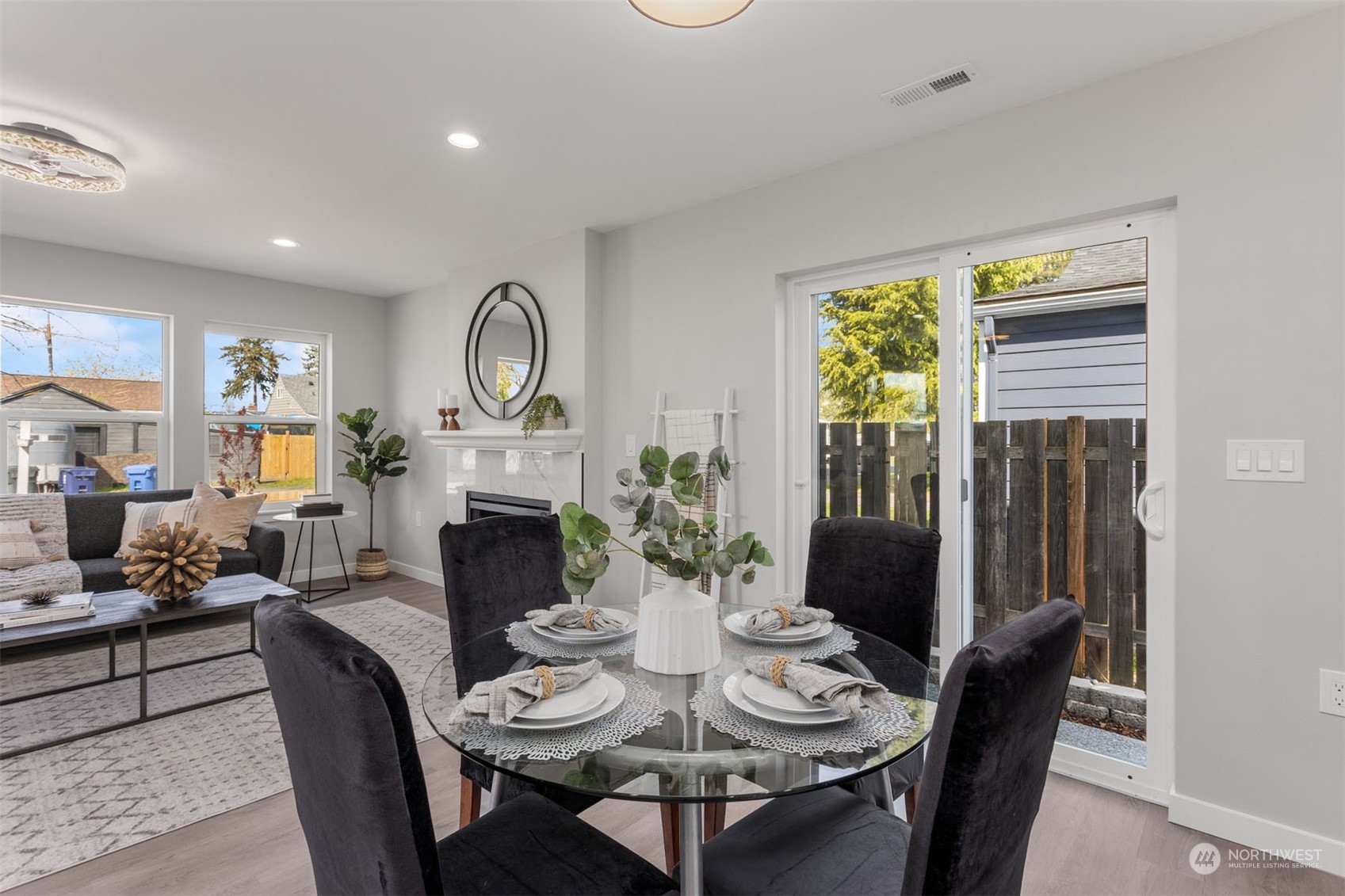 6633 South Pine Street Tacoma, WA 98409 - Photo 11 of 23 a view of a dining room with furniture window and outside view