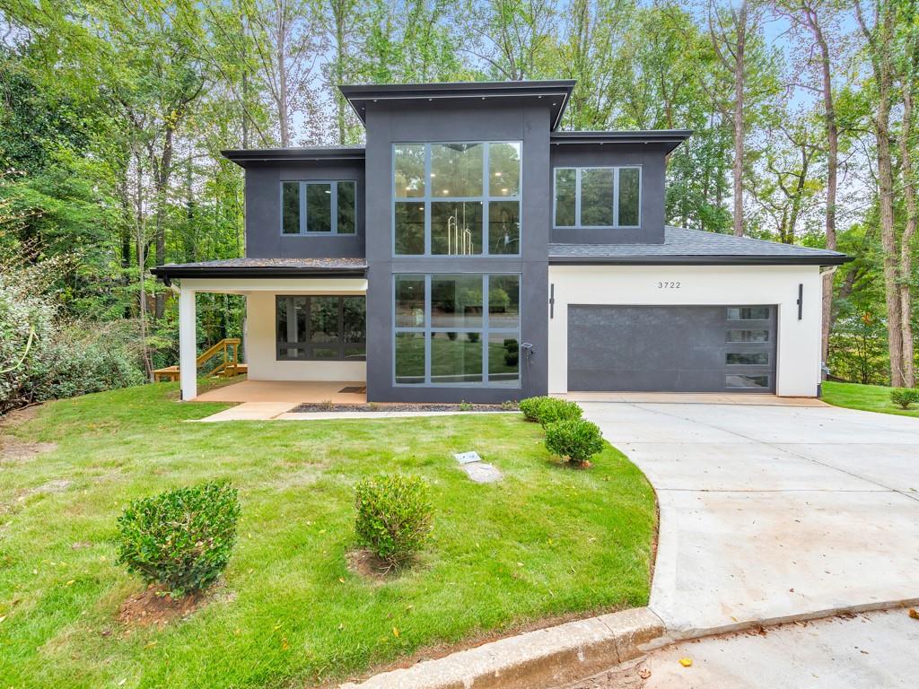 front view of a house with a yard
