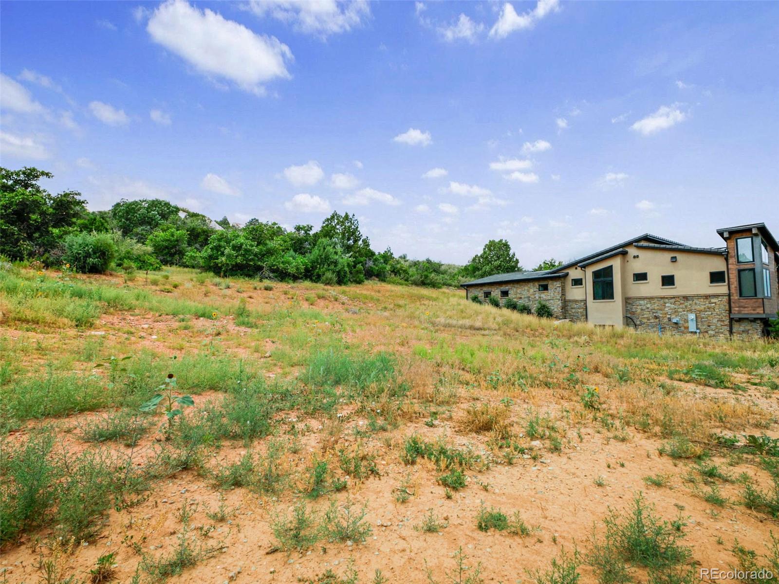 7983 Raphael Lane Littleton, CO 80125 - Photo 12 of 26 a view of an outdoor space and a lake view