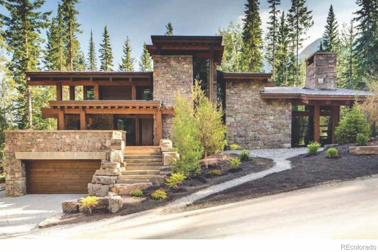 7983 Raphael Lane Littleton, CO 80125 - Photo 2 of 26 front view of a house with a street