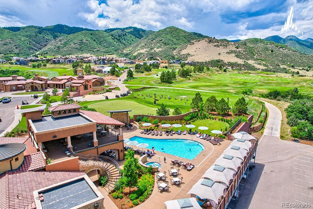 7983 Raphael Lane Littleton, CO 80125 - Photo 24 of 26 a view of a chairs and table in a yard