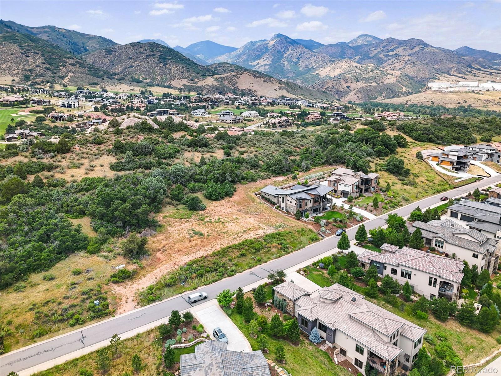 7983 Raphael Lane Littleton, CO 80125 - Photo 3 of 26 an aerial view of residential houses with outdoor space