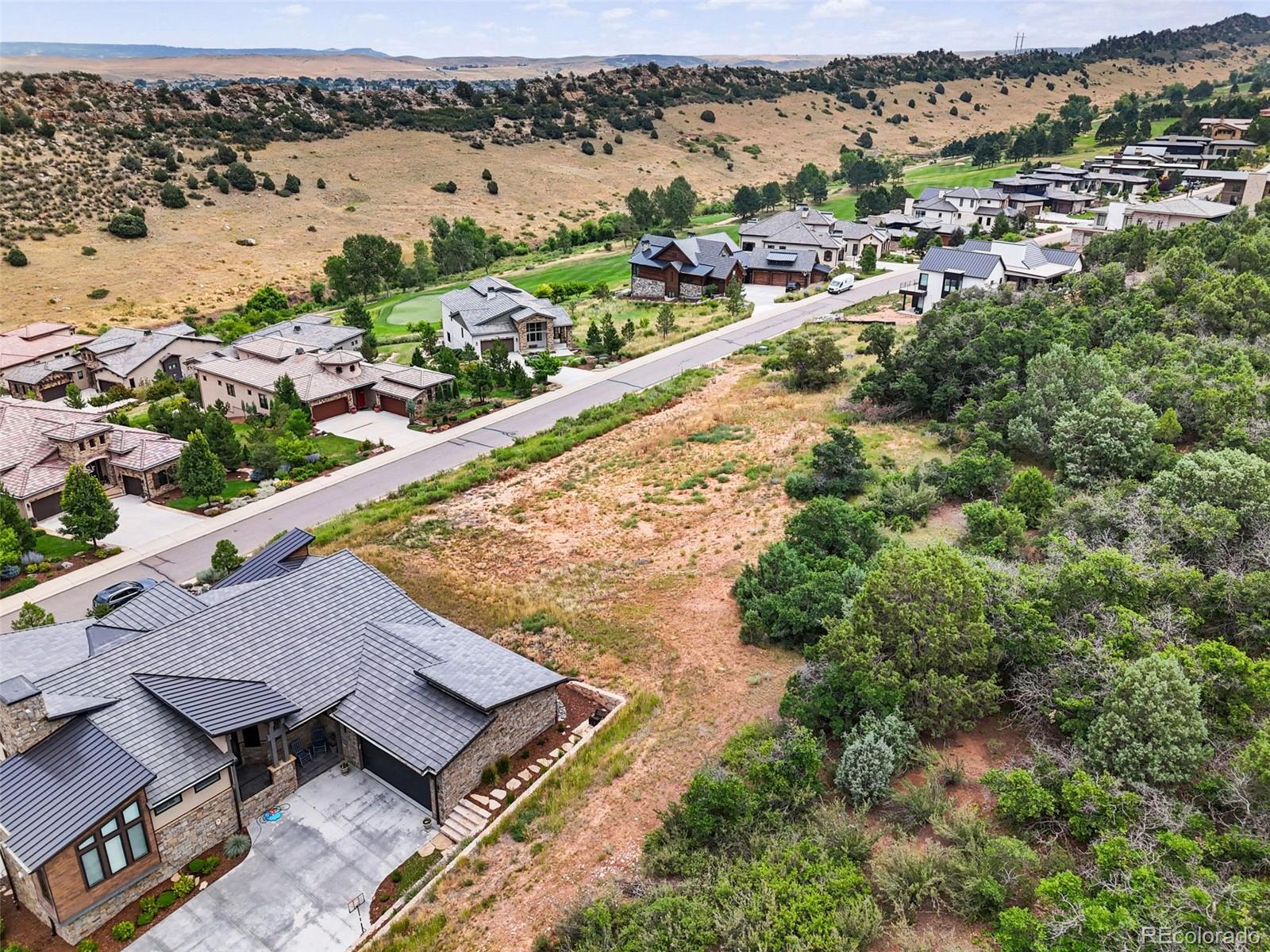 7983 Raphael Lane Littleton, CO 80125 - Photo 4 of 26 an aerial view of residential houses with outdoor space