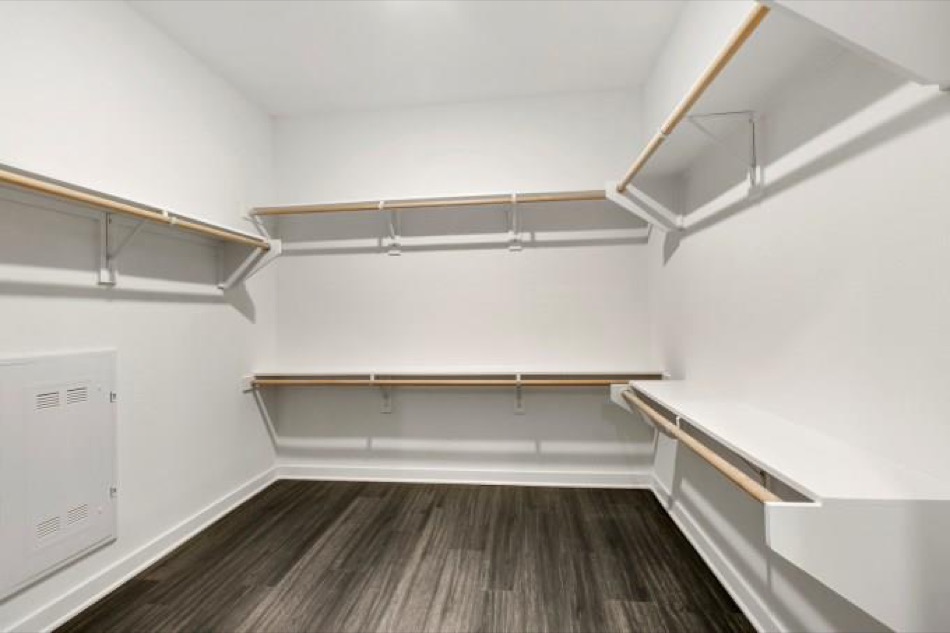 4361 South Congress Avenue, Unit 314 Austin, TX 78745 - Photo 14 of 25 a storage room with wooden floor