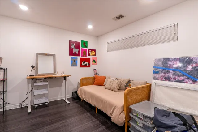 a storage room with wooden floor