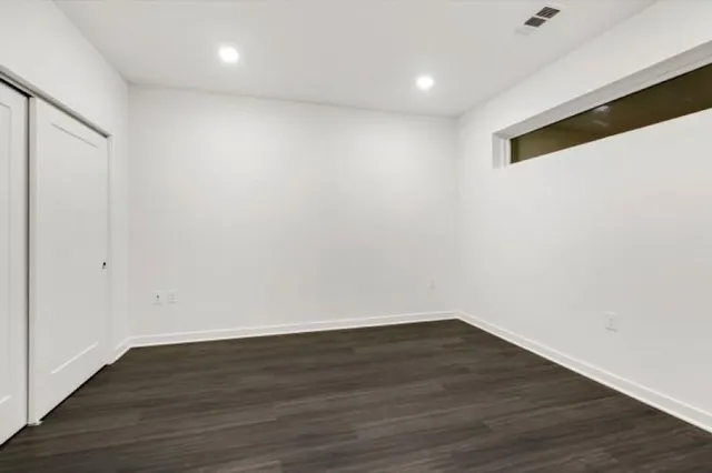 a workspace with furniture and wooden floor