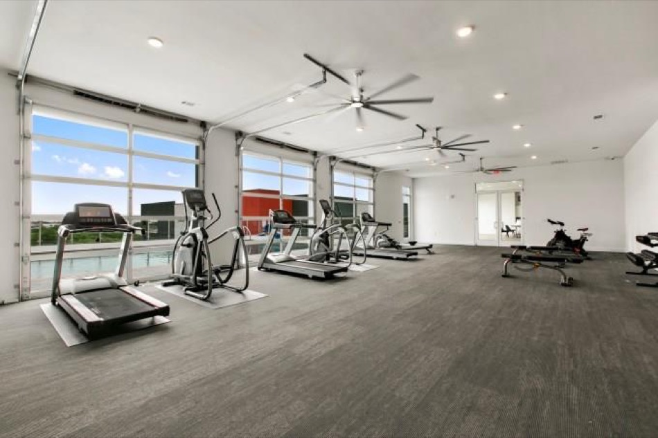 4361 South Congress Avenue, Unit 314 Austin, TX 78745 - Photo 21 of 25 a view of a room with gym equipment